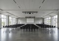 Empty conference hall with rows of chairs Royalty Free Stock Photo