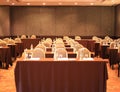 An empty conference meeting room in seminar hall with tables and chairs background Royalty Free Stock Photo