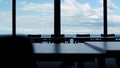 Empty conference office room with large panorama window at sea cloud sky view. Royalty Free Stock Photo