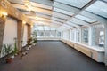 Empty conservatory with small number of plants and glass ceiling Royalty Free Stock Photo