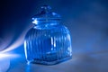 Empty cookie jar on a blue background Royalty Free Stock Photo