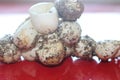 Empty corn snake eggs on a red table