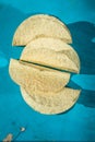 Empty corn taco shell in a blue background Royalty Free Stock Photo
