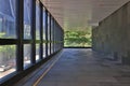 Empty corridor in modern office building with green tree outside 22 Aug 2021 Royalty Free Stock Photo