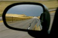 Empty Country Road in Side View Mirror Royalty Free Stock Photo