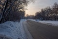 Empty countryside road. Snow covered trees Royalty Free Stock Photo