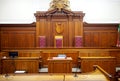 Empty courtroom, with old wooden paneling