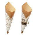 Empty craft paper cornets with tied rope bow and doily