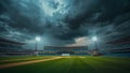 Empty cricket stadium waits under dramatic dark storm clouds illuminated by tall bright floodlights preparing for an exciting Royalty Free Stock Photo
