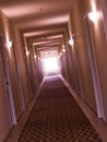 Empty, crooked hotel corridor Royalty Free Stock Photo