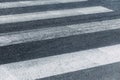 Empty crosswalk in gray and white. Pedestrian crossing, asphalt road. Royalty Free Stock Photo