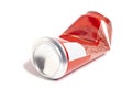 Empty crumpled red can from energy drink or beer Royalty Free Stock Photo