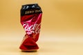 Empty and crushed Coca Cola can