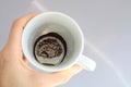 Empty cup of coffee to tell fortunes. Drawing of coffee grounds predicts future