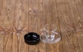 Empty cup with dish and ashtray on wooden texture Royalty Free Stock Photo