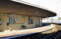 Empty curved railway station platform, Carnforth.