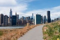 Empty Trail up a Hill at Hunters Point South Park in Long Island City Queens with a view of the Manhattan Skyline of New York City Royalty Free Stock Photo