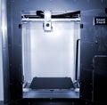 Empty 3d printer close up. 3d printer with empty desktop inside. Cope space. Royalty Free Stock Photo