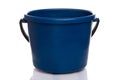 empty dark blue plastic bucket with a black handle on a white background Royalty Free Stock Photo