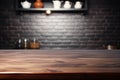 empty dark wooden table against blurred kitchen interior background Royalty Free Stock Photo