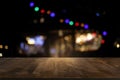 Empty of dark wooden table in front of abstract blurred background of bokeh light . can be used for display or montage your Royalty Free Stock Photo