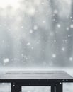 Empty dark wooden table and snow blurred background. Royalty Free Stock Photo