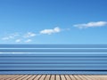 an empty deck with a blue sky and clouds in the background