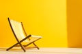 Empty deck chair on yellow background. Sunbed, studio shot. Beach tourism, travel, relax, vacai, holiday background. Minimal