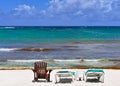 Empty deck chairs, empty beach and no people in the water in times of the Corona Virus Royalty Free Stock Photo