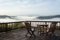 Empty deck overlooking fogcovered countryside