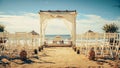 Empty Decorated Outdoors Wedding Venue with Chairs for Official Ceremony on a Beach Near the Sea or