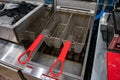 Empty deep fryer in a restaurant kitchen Royalty Free Stock Photo