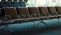 Empty departure airport lounge with new seats Royalty Free Stock Photo