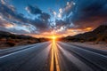 Empty desert highway at sunset with dramatic clouds Royalty Free Stock Photo