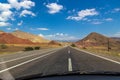 Empty Desert Road Running Through Mountains Royalty Free Stock Photo