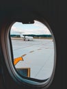 Empty deserted airport, view from the window of an airplane who standing at the airport, concept of closing airports and