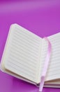 diary on purple background Royalty Free Stock Photo