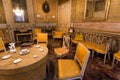 Empty dining room room with antique furniture and paintings in Palazzo Alliata di Villafranca, Baroque aristocratic home