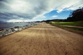 Empty dirt pedestrian and sports running and cyclist road in San Francisco city park near ocean. Royalty Free Stock Photo