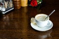 Empty and dirty cup of coffee on the table with copyspace in Italian restaurant Royalty Free Stock Photo