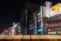 Display wooden board with copy space for advertising backdrop and background with Japan city night skyline background