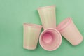 Empty disposable pink plastic cups Royalty Free Stock Photo