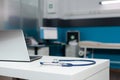 Empty doctors office room with medical equipment