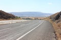 Empty double road highway with white lanes