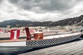 Empty dragon boats ready for race. Tinted photo Royalty Free Stock Photo