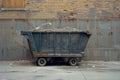 An empty dumpster for construction waste debris near a construction site is loaded up with debris Royalty Free Stock Photo