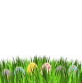 Empty easter card with eggs in pastel colors. Few decorative egg lying on green grass. Holiday vector design on white background