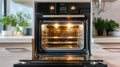 Empty electric oven with open door in modern kitchen Royalty Free Stock Photo