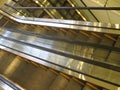 Empty electric stairs, aerial view of automatic escalators in motion and without people.