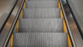 An empty escalator going down close up Royalty Free Stock Photo